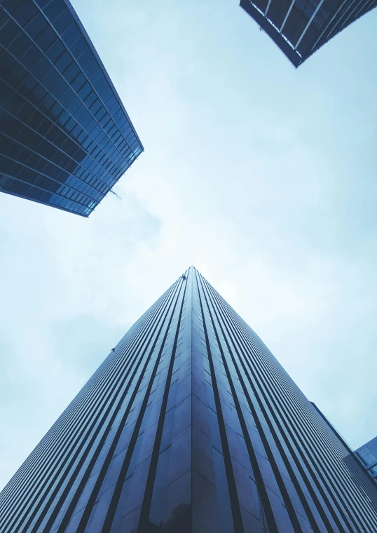 a group of tall buildings in a city, pexels contest winner, hypermodernism, creating a thin monolith, sharp centred focus, up there, ((sharp focus))