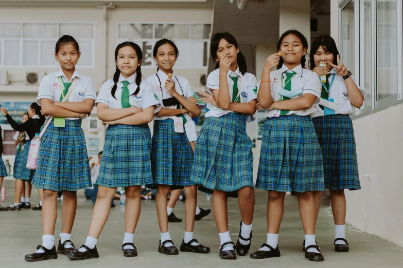 a group of young girls standing next to each other, pexels contest winner, vancouver school, philippines, avatar image, background image