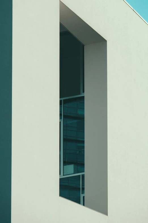 a white building with a blue sky in the background, a minimalist painting, by Bauhaus, unsplash, paul barson, detail render, monochromatic teal, ignant