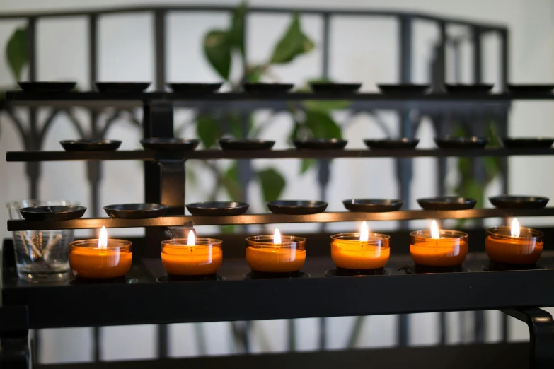 a group of candles sitting on top of a table