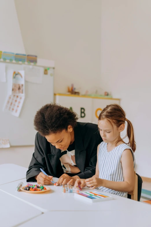 a man and a little girl sitting at a table, a child's drawing, pexels contest winner, academic art, slightly minimal, teacher, elegantly dressed, teaching