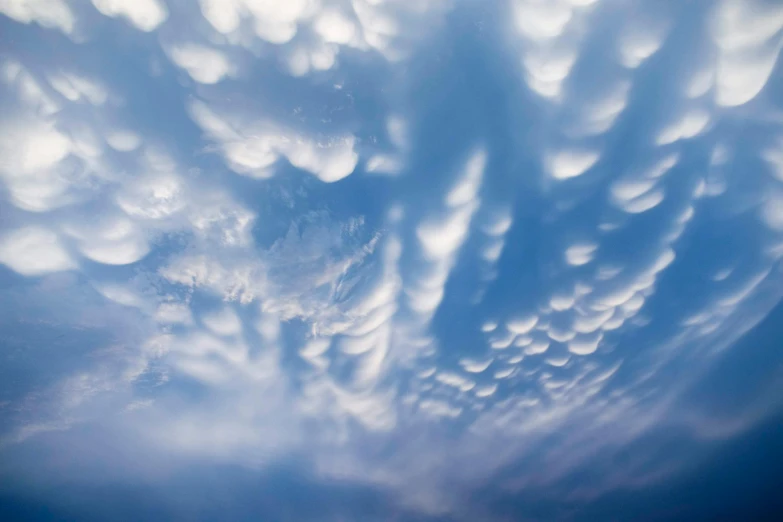 a sky filled with lots of white clouds, by Jan Rustem, unsplash, surrealism, mammatus clouds, slide show, scientific photo, rippling