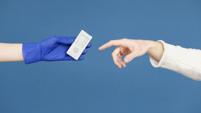 a person in blue gloves is handing something to another person, an album cover, unsplash, medical equipment, avatar image, diagnostics, rectangle