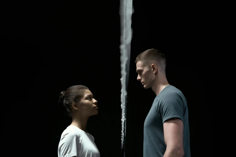 a man and a woman standing next to each other, a hologram, unsplash, conceptual art, nadav kander, hito steyerl, sweaty. steam in air, profile image