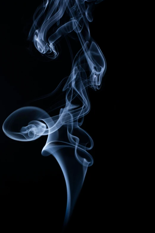 a close up of smoke on a black background, by Matt Cavotta, pexels, light blues, incense, spiraling, joints