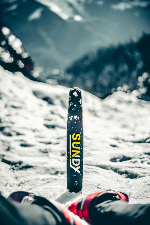 a bottle of soda sitting on top of a snow covered slope, profile image, sunshafts, 'groovy', dramatic product shot