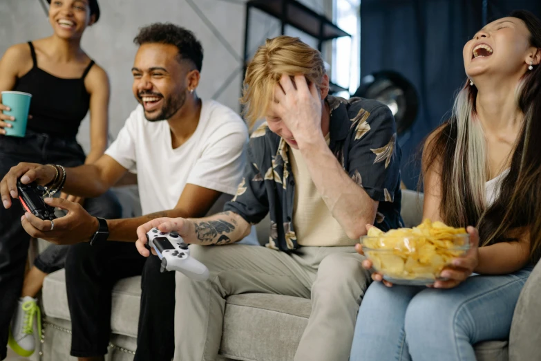 a group of people sitting on a couch playing video games, pexels, renaissance, embarrassed, 😭🤮 💔, attractive photo, background image