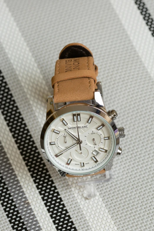 a close up of a watch on a table, a portrait, michael kors, thumbnail, highdetailed, in 2 0 1 5