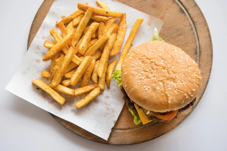 a hamburger and french fries on a cutting board, by Carey Morris, pexels, visual art, 15081959 21121991 01012000 4k, restaurant menu photo, anime food, thumbnail