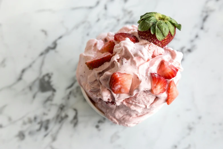 a bowl of strawberry ice cream with a strawberry on top, trending on unsplash, renaissance, on a large marble wall, multi - layer, 3/4 view from below, four legged