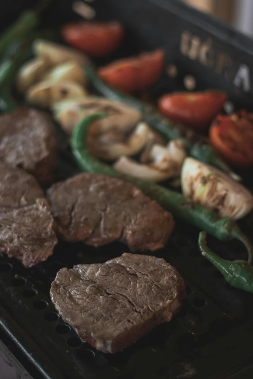 a close up of meat and vegetables on a grill, by Manuel Ortiz de Zarate, 3 - piece, 6 pack, rustic, steak
