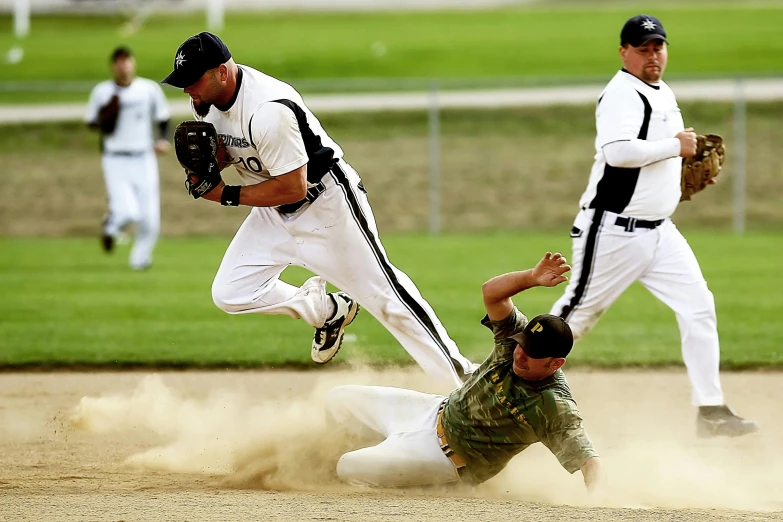 a couple of men playing a game of baseball, sprawled out, winner of the year's best photo, thumbnail, 15081959 21121991 01012000 4k