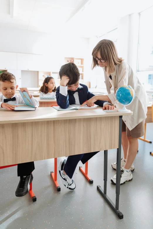 a group of children sitting at desks in a classroom, pexels contest winner, paris school, looking exhausted, inspect in inventory image, future coder man looking on, panoramic view of girl