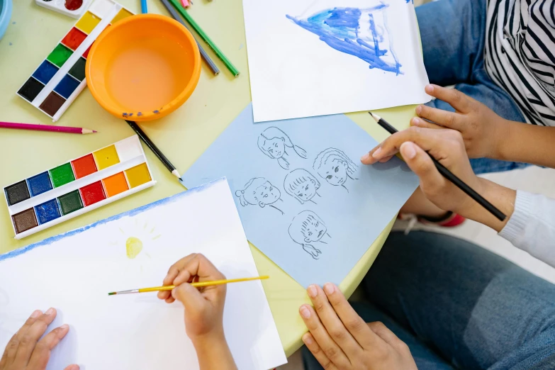a group of people sitting around a table drawing, a child's drawing, trending on pexels, process art, close up portrait shot, a painting of two people, cartoon image, no - text no - logo