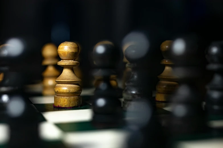 a group of chess pieces sitting on top of a chess board, by Daniel Lieske, unsplash, synthetism, neck zoomed in, a wooden, portrait mode photo, thumbnail