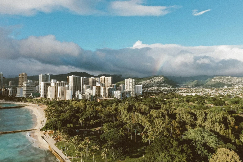 a view of a city with a rainbow in the sky, hawaii beach, flatlay, landscape photo, hyperdetailed photo