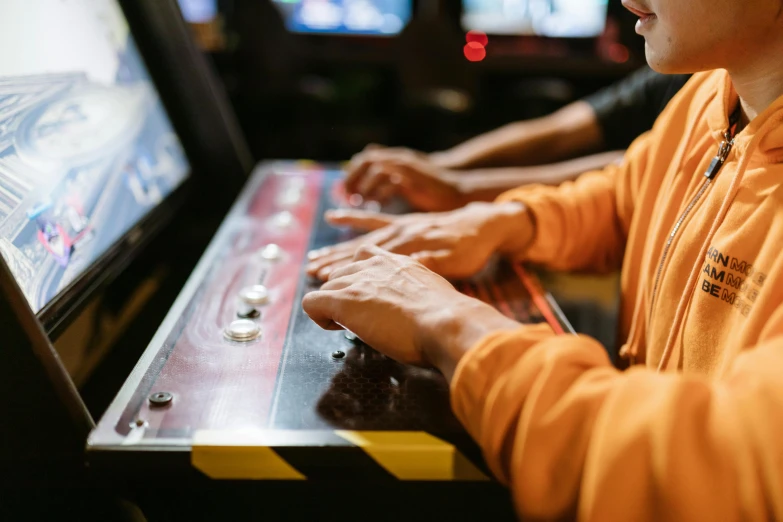 a close up of a person playing a video game, pexels, neogeo, dive bar with a karaoke machine, avatar image, gambling, brown