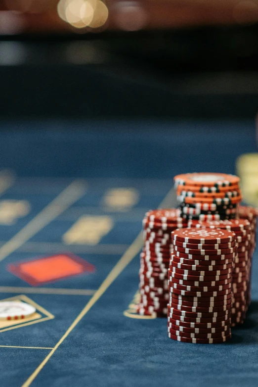 a casino table with chips and cards on it, thumbnail, royaltly, up close image