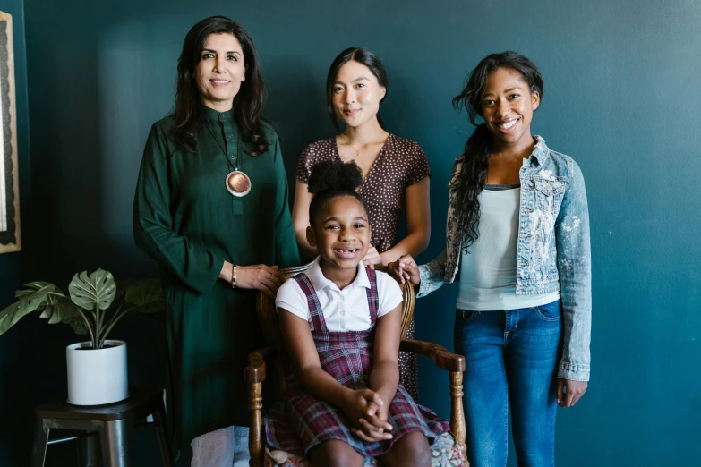 a group of women standing next to each other, in style of norman rockwell, mixed race, promo image, family photo