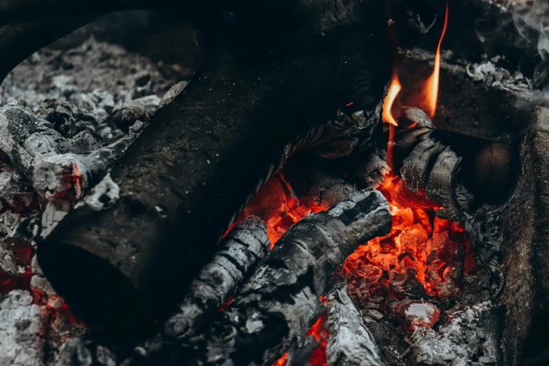 a close up of a fire in a fire pit, pexels contest winner, burnt huts, “ iron bark, thumbnail, background image