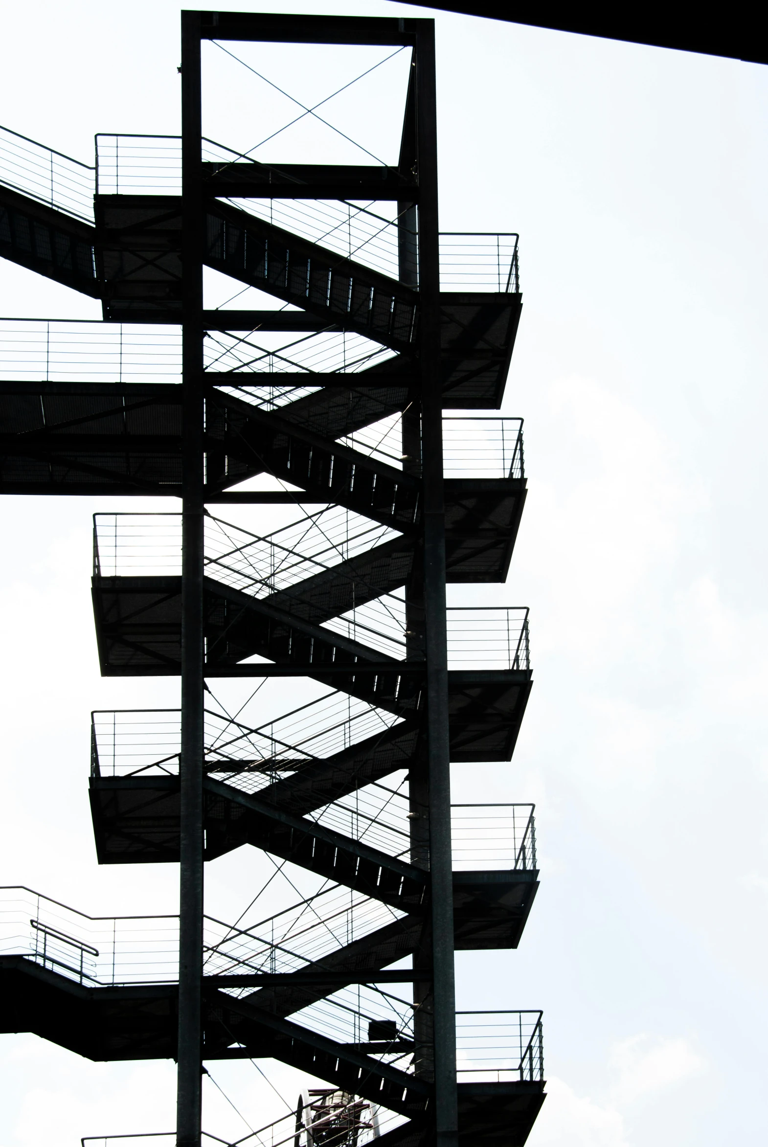 a man riding a skateboard on top of a metal structure, pexels contest winner, bauhaus, outdoor staircase, lookout tower, hoog detail, square