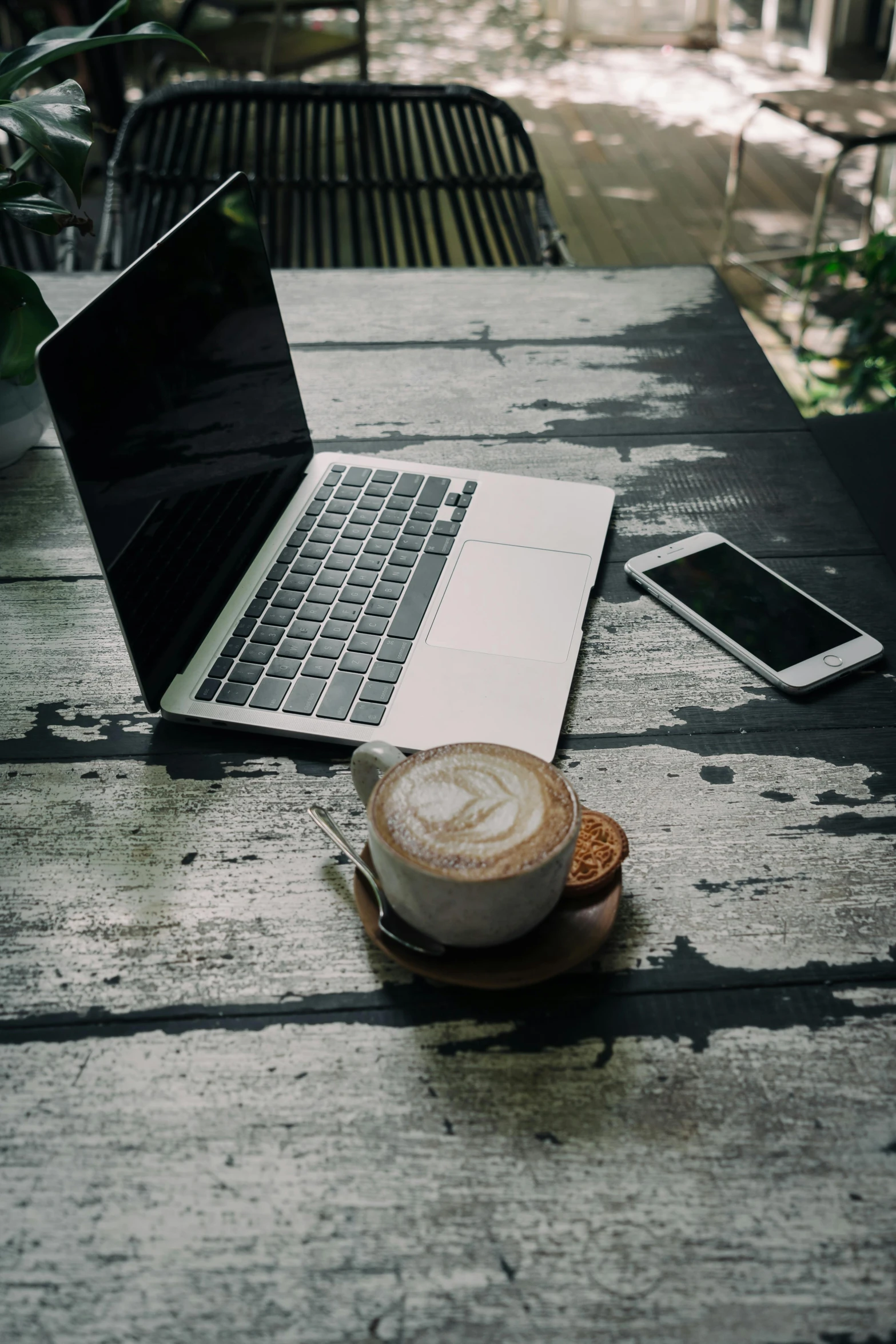 a laptop computer sitting on top of a wooden table, by Sebastian Vrancx, unsplash, cappuccino, ilustration, multiple stories, an abandoned