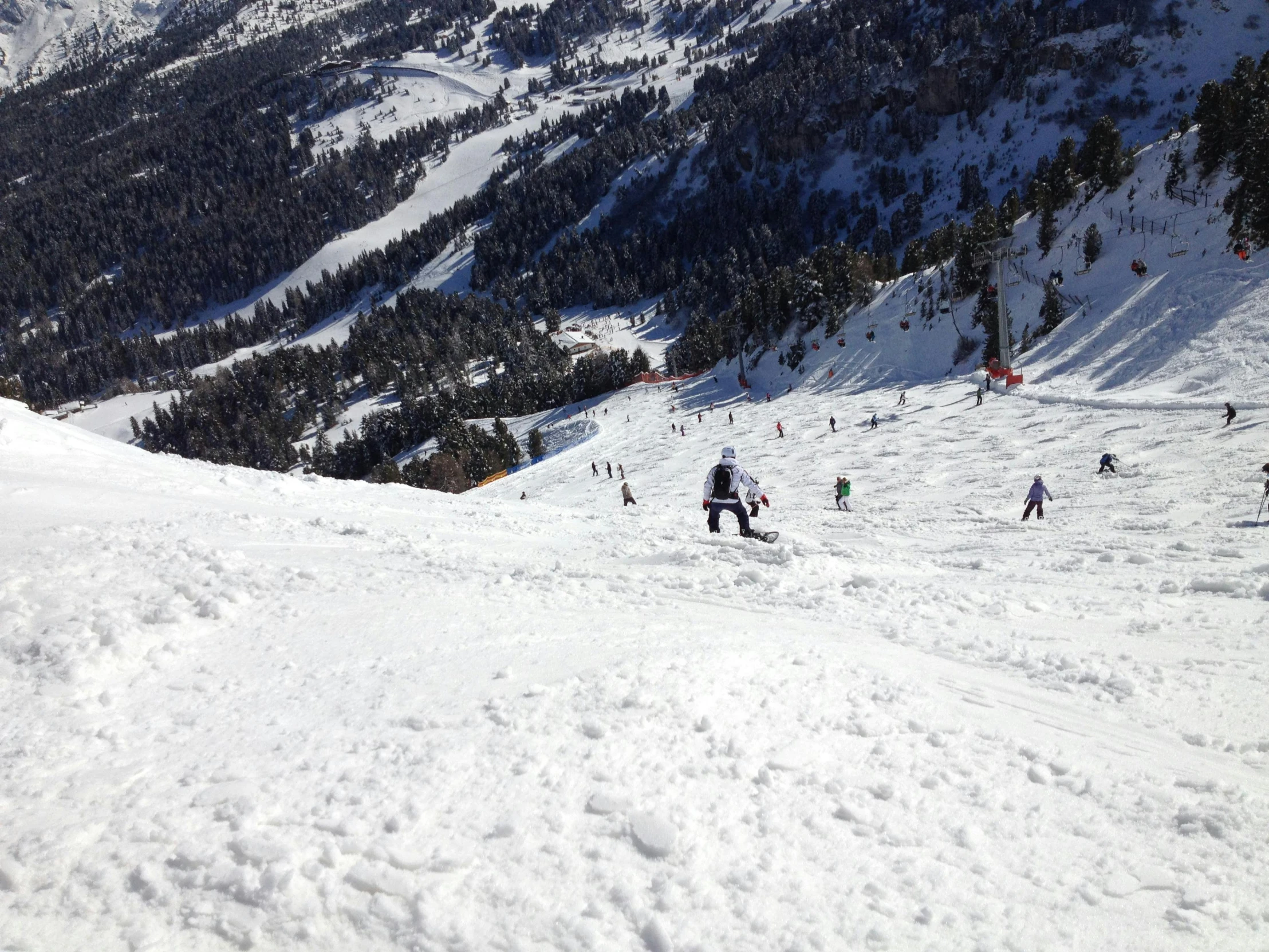 a group of people riding skis down a snow covered slope, caparisons, profile image, tourist photo, overview