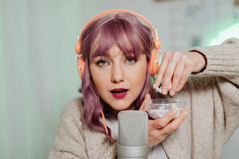 a woman with headphones sitting in front of a microphone, trending on pexels, antipodeans, head in a jar, lilac hair, thumbnail, no repeat