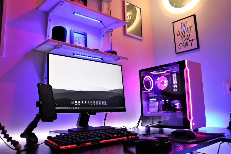 a desktop computer sitting on top of a wooden desk, featured on reddit, maximalism, blue and purle lighting, brightly lit pink room, pc game with ui, 5000k white product lighting