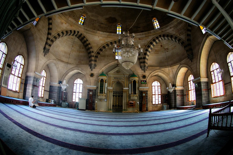 a large room filled with lots of windows and a chandelier, hurufiyya, ((fish eye)), mosque, getty images, single floor