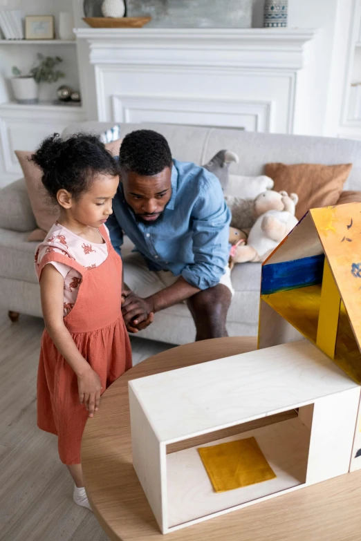 a man and a little girl playing with a doll house, pexels contest winner, modernism, warm colored furniture, inspect in inventory image, varying ethnicities, tabletop model