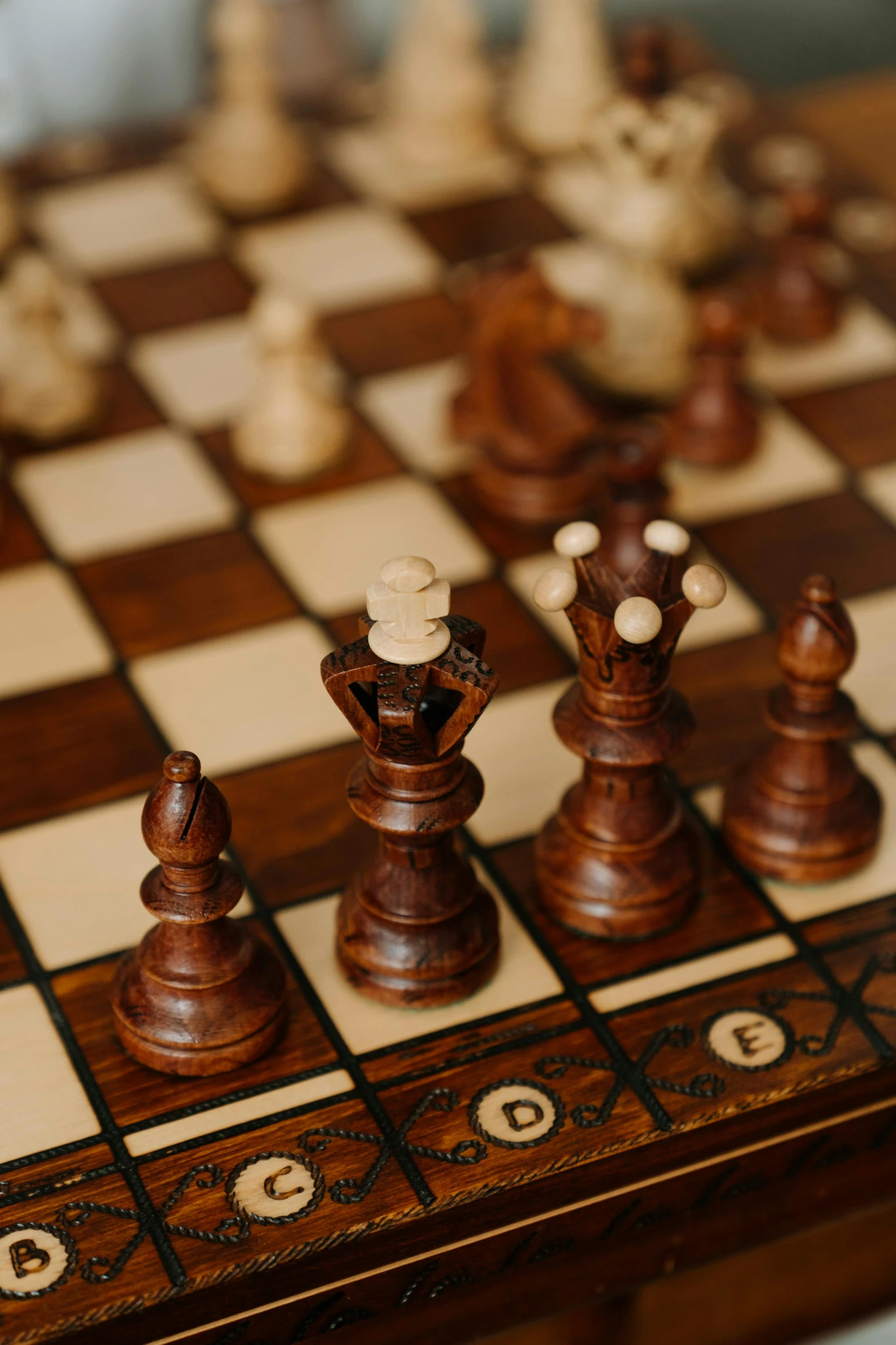 a wooden chess board with chess pieces on it, by Adam Marczyński, unsplash, renaissance, square, high angle close up shot, high quality photo, with crown