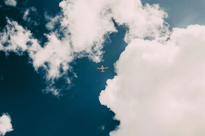 a plane flying through a cloudy blue sky, pexels contest winner, thumbnail, unsplash photo contest winner, mixed art, float