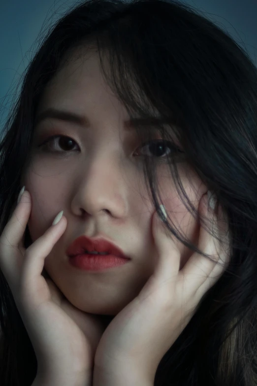 a woman holding her hands to her face, an album cover, inspired by Jung Park, unsplash, hyperrealism, bae suzy, closeup headshot, chinese woman, lovingly looking at camera