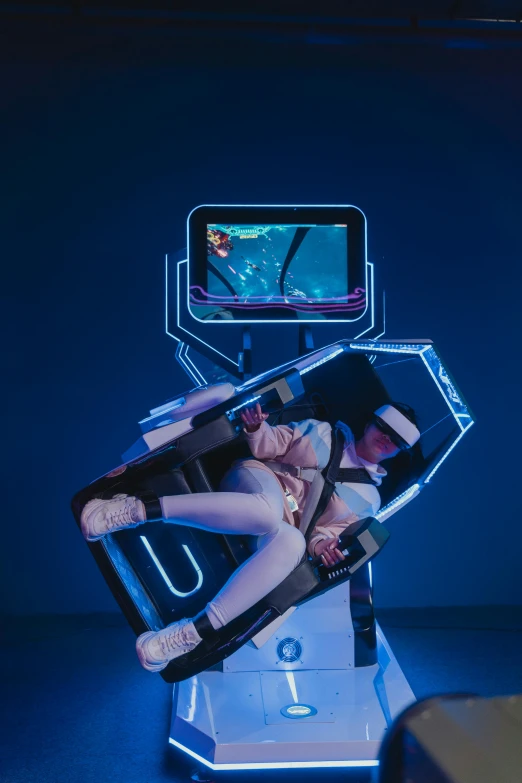 a couple of people that are sitting in a chair, inspired by Leng Mei, unsplash, interactive art, arcade game, posing robotically, girl in space, full shot photograph