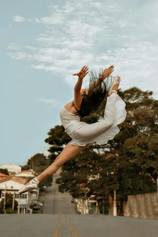 a woman flying through the air while riding a skateboard, an album cover, pexels contest winner, arabesque, wearing white leotard, nature outside, performance, square