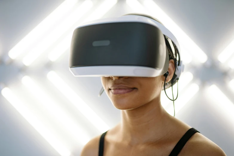 a woman wearing a virtual reality headset, inspired by Évariste Vital Luminais, unsplash, fully frontal view, wearing gaming headset, a very macular woman in white, akali