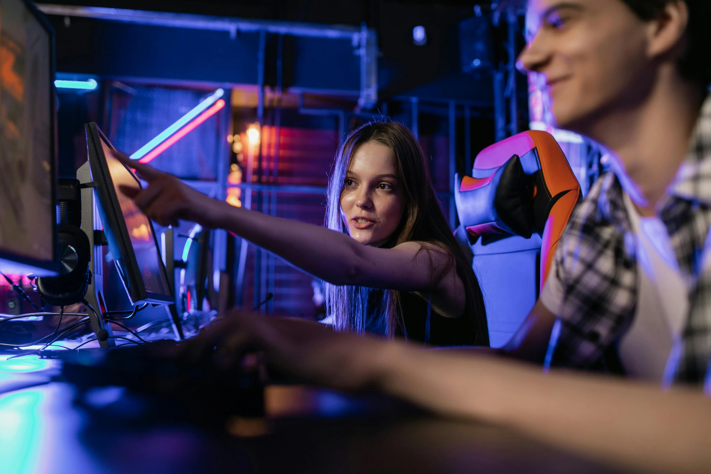 a man and a little girl playing a video game, shutterstock, interactive art, in a nightclub, avatar image, teenager hangout spot, the fourth race of starcraft 2