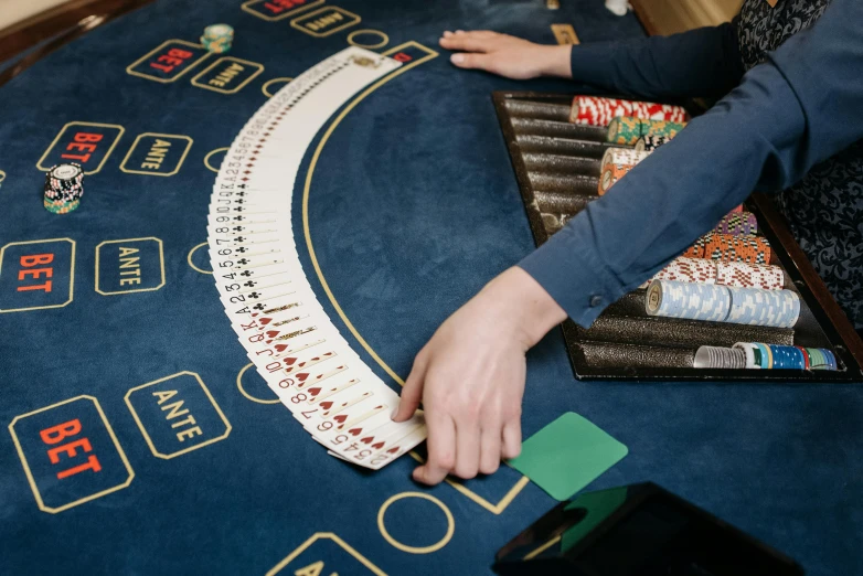 a woman is playing blackjack in a casino, a screenshot, by Julia Pishtar, pexels contest winner, high angle close up shot, pitch bending, 15081959 21121991 01012000 4k, table is centered