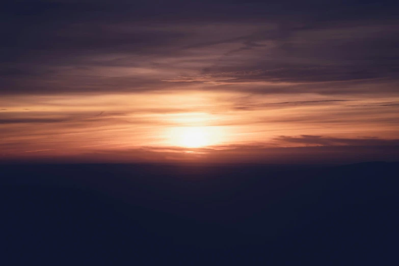 the sun is setting behind the clouds in the sky, pexels contest winner, romanticism, slight haze, horizon, (night), high resolution