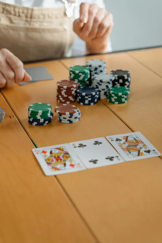 a woman sitting at a table playing a game of poker, unsplash, 15081959 21121991 01012000 4k, panorama, high angle close up shot, thumbnail