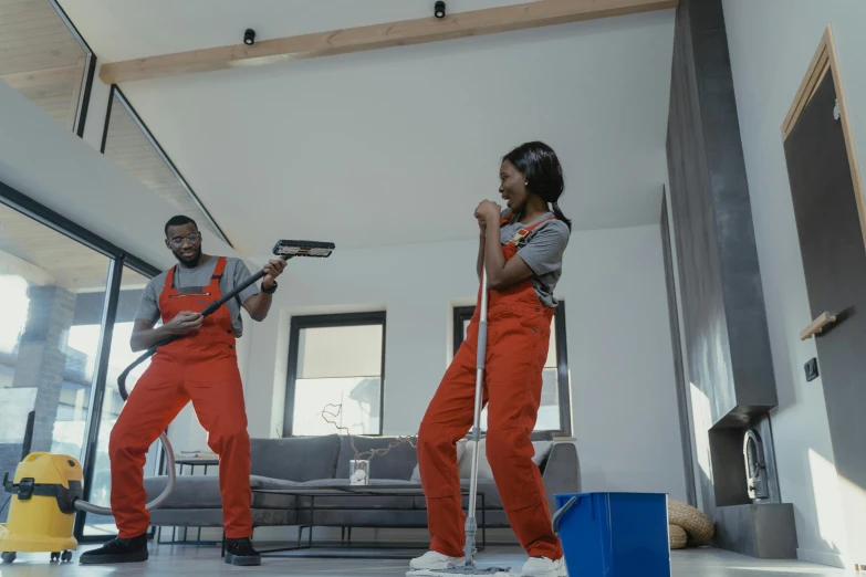 a couple of people that are standing in a room, sweeping, mkbhd, thumbnail, hammershøi