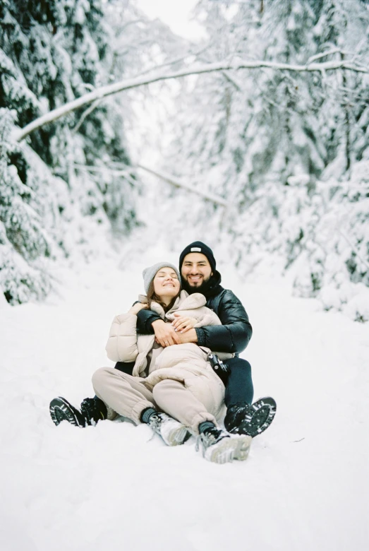 a man and a woman are sitting in the snow, a polaroid photo, pexels contest winner, 🎀 🧟 🍓 🧚, bright nordic forest, excited russians, luca