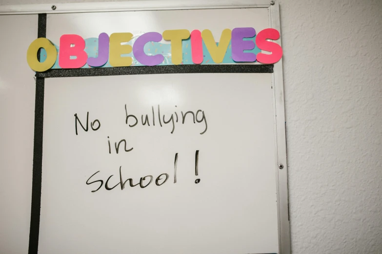 a sign that says no bullying in school, pexels, new objectivity, plus-sized, « attractive, background image, whiteboard