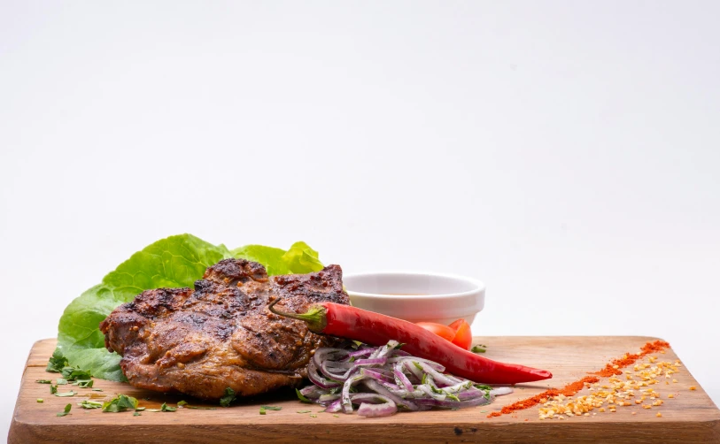 a wooden cutting board topped with meat and vegetables, nivanh chanthara, background image, profile image