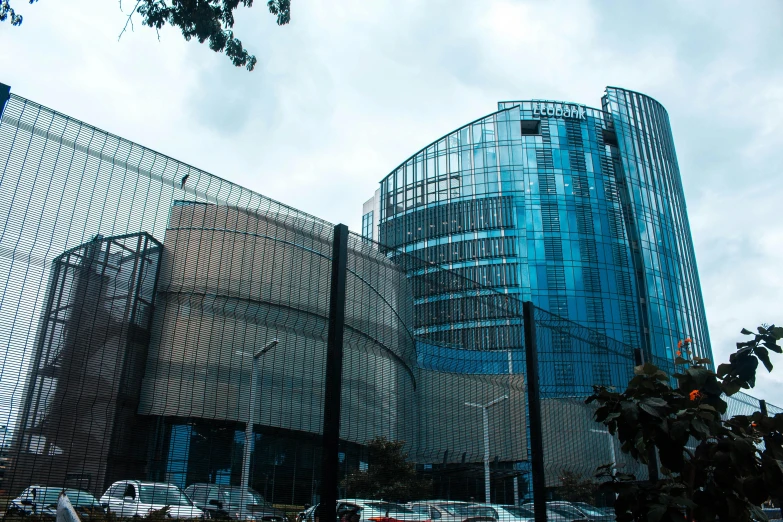 a group of cars parked in front of a building, skydome, south jakarta, glass and steel, uhq