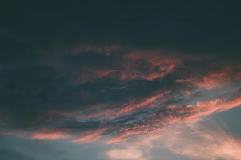 a couple of people standing on top of a beach under a cloudy sky, inspired by Elsa Bleda, pexels contest winner, aestheticism, red cumulonimbus clouds, night clouds, faded pink, looking up onto the sky