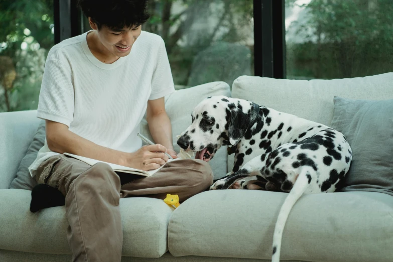 a man sitting on a couch with a dalmatian dog, a drawing, by Jang Seung-eop, pexels contest winner, drawing pictures on a notebook, thumbnail, sharpie, ad image