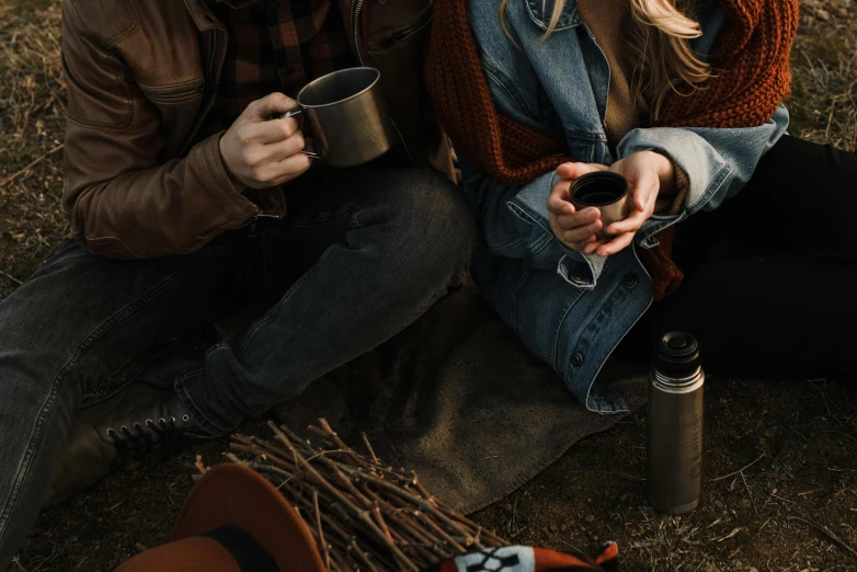 a man and a woman sitting next to each other, trending on pexels, romanticism, cold brew coffee ), camping, 15081959 21121991 01012000 4k, flatlay