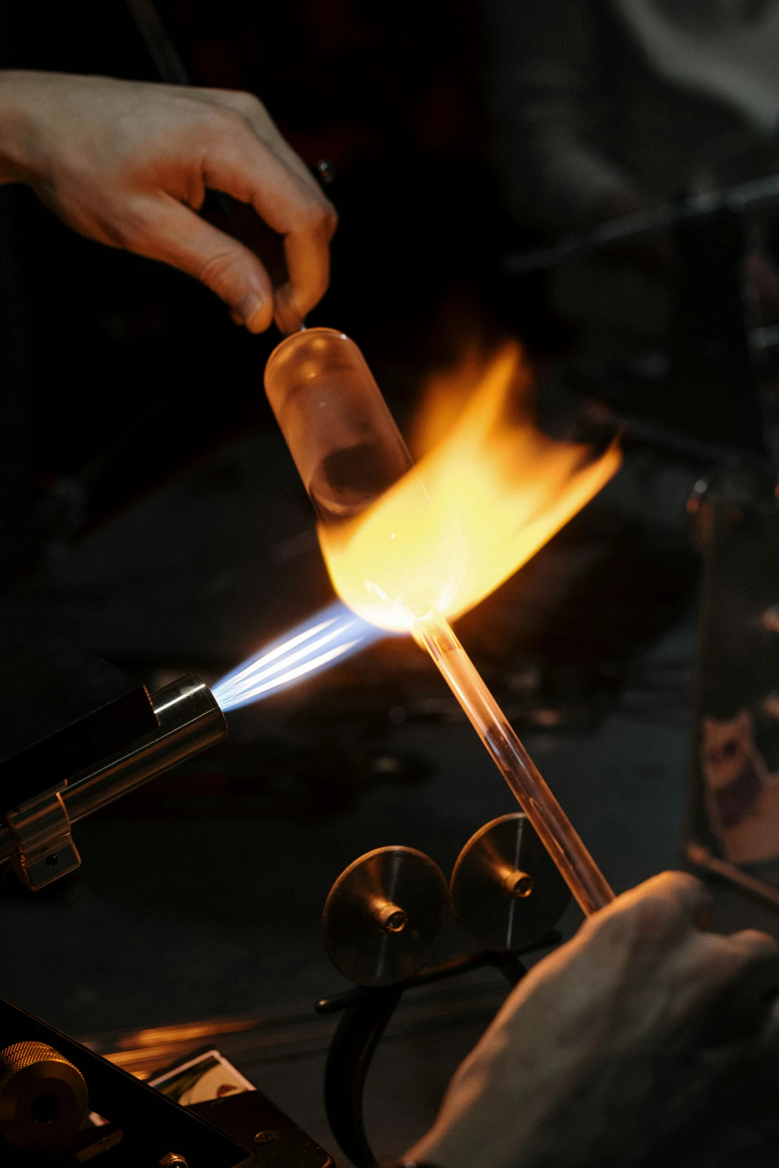 a close up of a person making something with a torch, glassware, fan favorite, fire & smoke, thumbnail